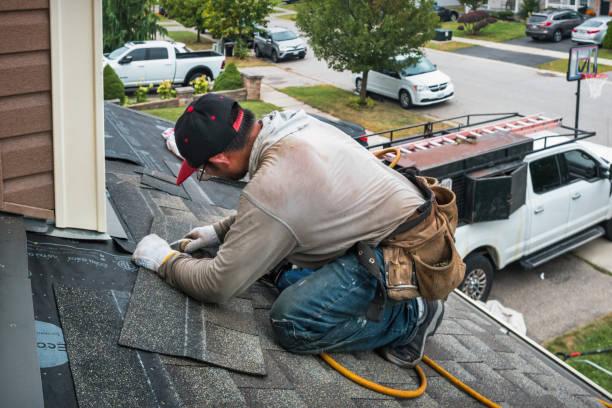 Professional Roofing technician working in Burton, TX
